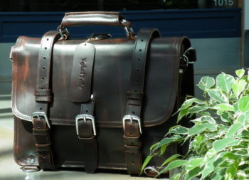 leather briefcase backpack vagarant traveler